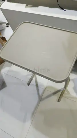 Small beige folding side table - lightweight and compact