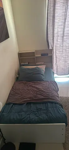 Single bed with mattress and built-in headboard storage - good condition  IKEA brand
