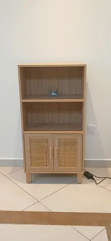 IKEA-style small wooden bookshelf with rattan doors - good condition