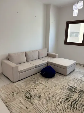 L Shaped Beige Sofa in good condition - W245xD88 CM. L = 178 CM. Right / Left compatible L