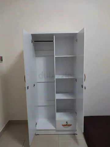 White Freestanding Cabinet with Multiple Shelves and Doors