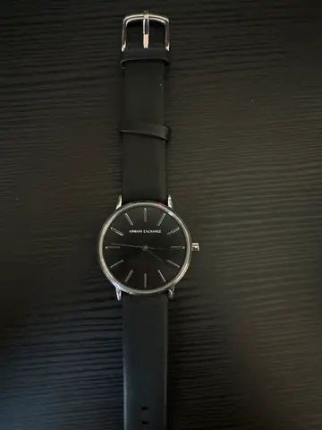 Classic black minimalist men's wristwatch with leather strap
