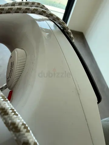 Used Steam Iron in Good Working Condition