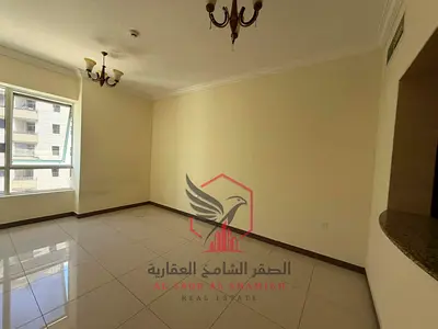 One month free, free gym access, and panoramic views: a beautiful one-bedroom apartment (bedroom and living room) for rent in Al Qasimiya with excelle