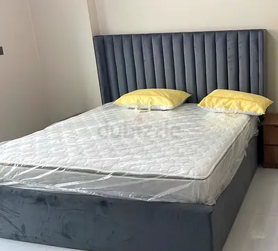 King size upholstered bed with hydraulic storage space and mattress