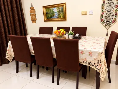 Dining table with 8 brown upholstered chairs - good condition