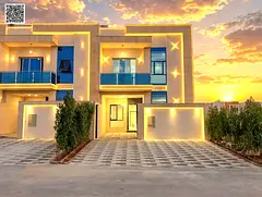 Villa for sale in Al Helio, Ajman—registration fees included. Features 6 master bedrooms, a majlis