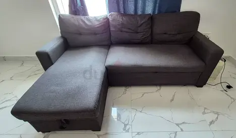 L-shaped grey fabric sofa with chaise. (Negotiable)
