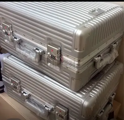 Set of 2 Silver Hard-shell Aluminum Carry Cases - Like New