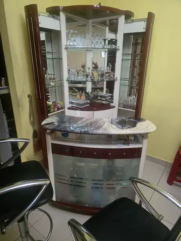 Wood and glass display cabinet with marble top — good condition