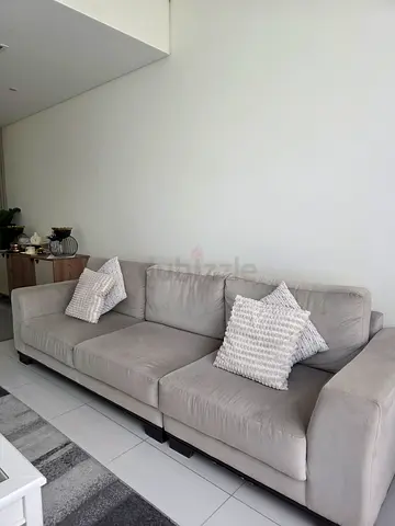 Light grey 3-seater fabric sofa in execellent condition price is negotiable