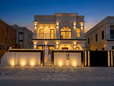 Luxury Villa for Sale in Al Rawda 3 – Ajman | First Occupant | Stone Facade | Land Area: 5,700 sq. ft. | 5 Master Bedrooms | Freehold Ownership