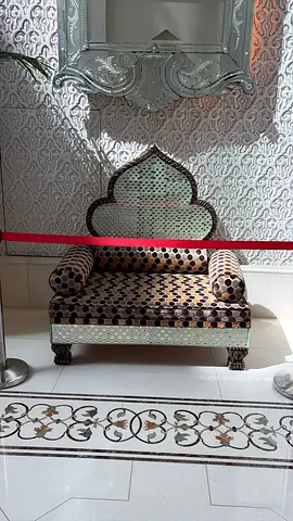 Small decorative upholstered bench with mirrored inlay