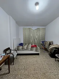 Executive and family room with furniture and attached both room