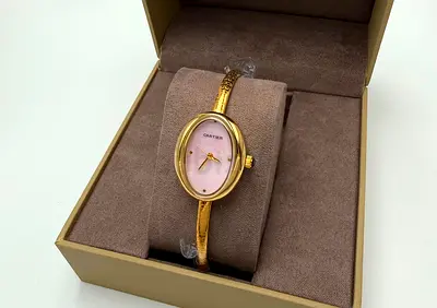 Gold-tone Cartier-style Women's Oval Bracelet Watch with Pink Dial