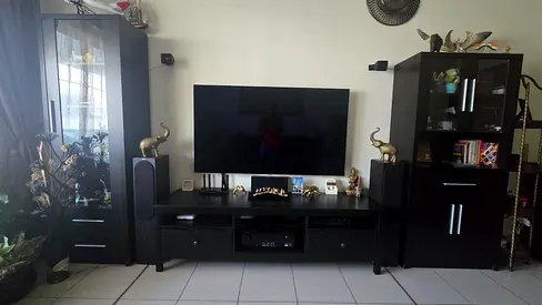 Entertainment TV unit with two display cabinet on either side for sale