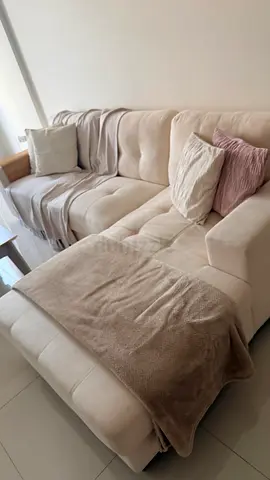 Beige L-shaped Fabric Sofa with Ottoman — Good Condition