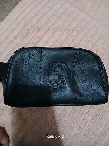 Black Gucci embossed leather pouch/case - genuine style