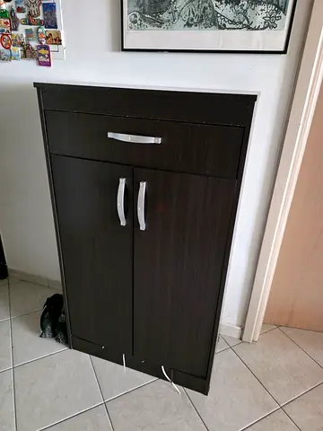 Dark wood color freestanding shoe cabinet with two doors and drawer - good condition