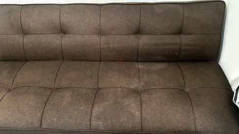 Brown fabric sofa bed / futon in good condition