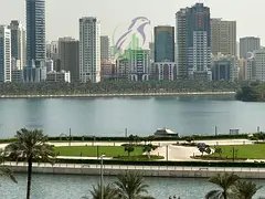 Spacious 2BR apartment for rent in Al Majaz 3. Features maid's room, 3 baths, balcony, and flexible