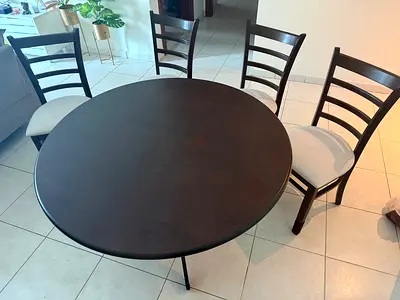 Set of 4 wooden dining chairs with beige fabric seats — good condition