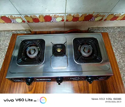 Used 3-Burner Stainless Steel Gas Stove in Working Condition with cylinder and accessories.