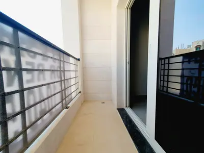 Brand new 1bhk with balcony and 2 washroom separate hall near to al zahia city center price 36k