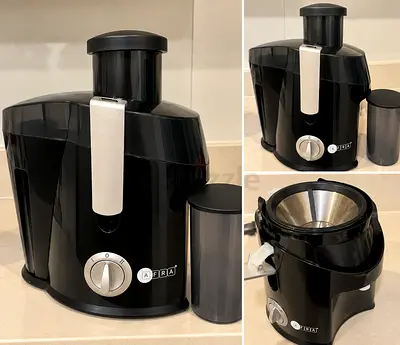 Electric Juice Extractor / Juicer - Black, Good Condition