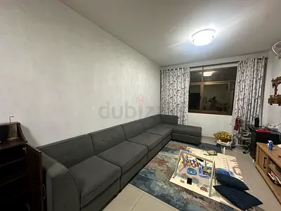 Large L-shaped grey fabric sectional sofa — good condition
