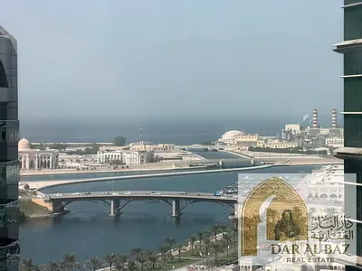 A three-bedroom apartment with a living room is available for annual rent in the Al Majaz 1 area of