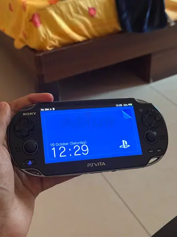 Sony PS Vita 1000(original) handheld console - working, with games/apps
