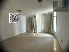 Two-bedroom apartment with a living room for rent in Al Khor Towers.