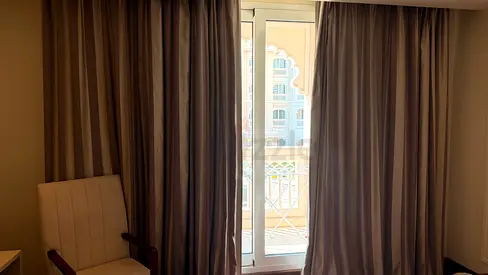 Pair of heavy blackout curtains with curtain track