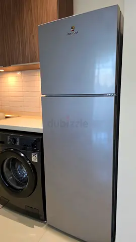 Silver top-freezer refrigerator - good condition