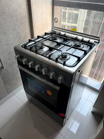 Midea Stainless Steel 4-Burner Gas Cooker with Oven - Good Condition