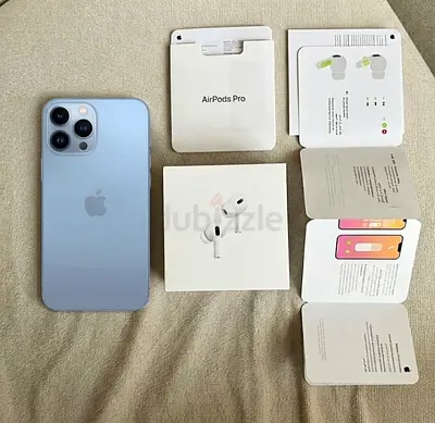 iPhone 13 Pro Sierra Blue) with AirPods Pro boxes - good condition