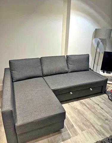 Grey L-shaped Sofa Bed with Storage - Good Condition