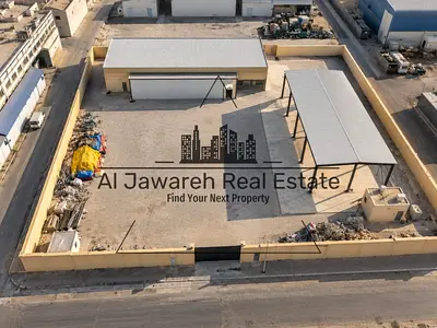 For rent: A warehouse with a large enclosed yard, suitable for all types of business activities, in the Emirate of Umm Al Quwain.