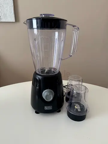 Black tabletop blender with chopper attachment — lightly used
