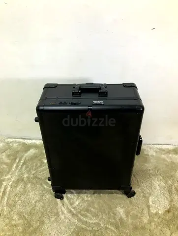 Black rolling makeup train case