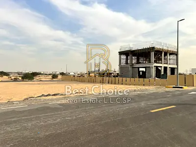 Two Adjacent Plots on a 15m Road in Al Hoshi
