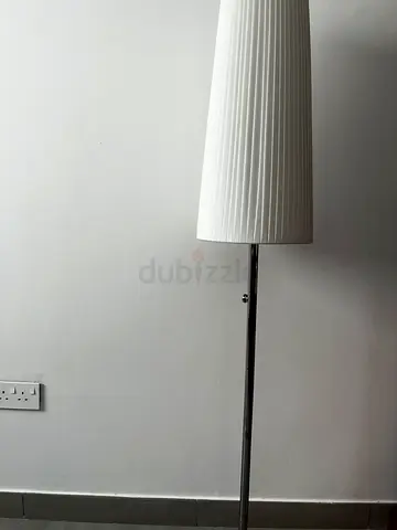 White Tall Floor Lamp with Ribbed Shade and Chrome Stand. Some stains but works perfectly.