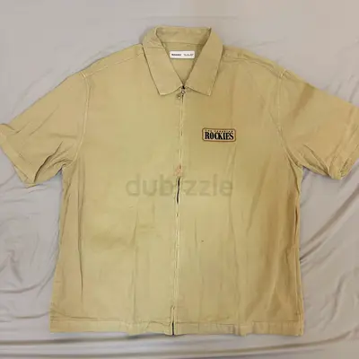 BERSHKA Beige Short Sleeve Zip-Up Shirt with Rockies Patch - Large