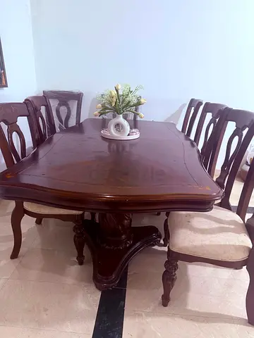 Want an original elegant and classic wood Dining table for your family? I am selling it
