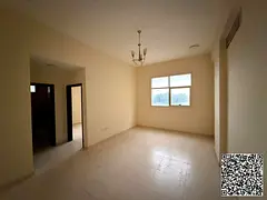 Two rooms and a living room in a prime location in Al Jurf 1