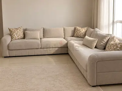 Light beige L-shaped fabric sectional sofa - comfortable family size