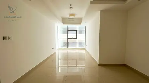 For annual rent in Ajman: a one-bedroom apartment with a living room, featuring premium amenities, in Gulf Tower, Khalifa Street. Includes two bathroo
