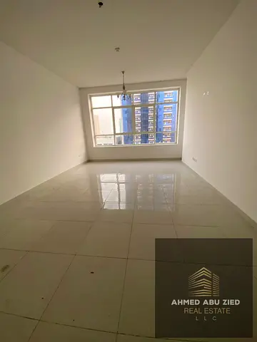 A two-bedroom apartment with a living area, situated in a prime location with a direct view of Shei