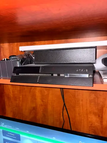 PlayStation 4 with two controllers and few games